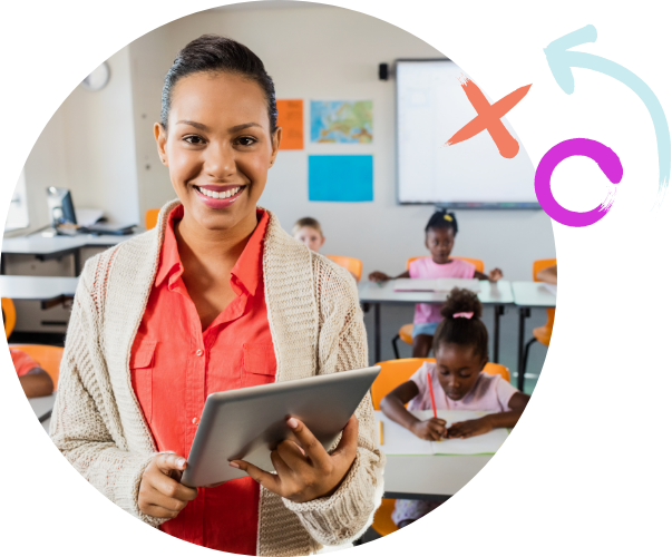 Smiling female-identifying teacher holding tablet